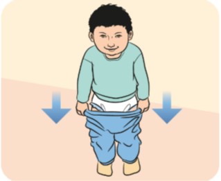 Boy pulling his pants down to go the toilet.